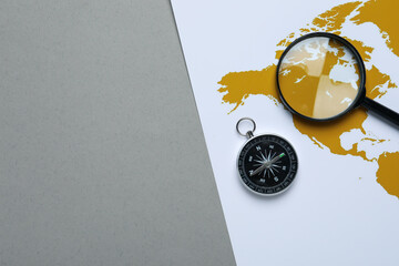 Traveling, adventure and vacation concept with compass