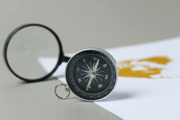Traveling, adventure and vacation concept with compass