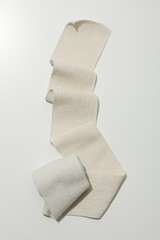 Help during an injury, elastic bandage on white background