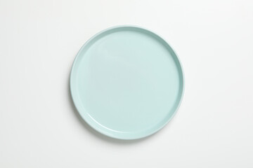 Empty plate on white background, top view