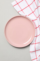 Minimal table setting with blank dish, top view
