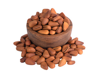 Pine nuts on white background. Pine nuts in shell.