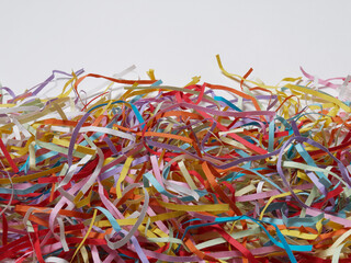  Colored shredded papers and white copy space