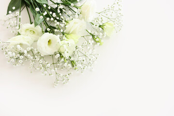 Top view image of delicate beautiful white flowers background