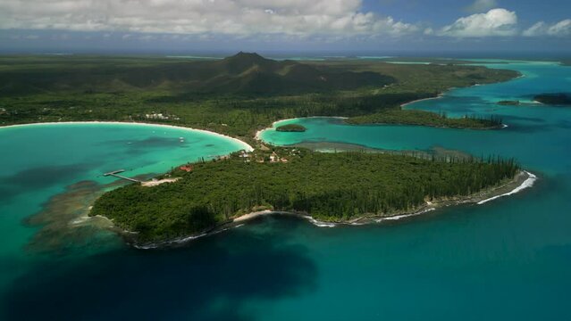 Aerial parallax above Kuto Peninsula separating Kuto and Kanumera Bay, Isle of Pines.