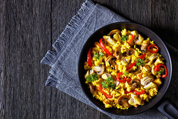 Chicken Paella with mushrooms, red pepper, spices