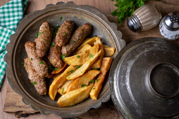 Traditional Turkish food; dry meatballs or inegöl meatballs with potatoes (Turkish name; Kuru...