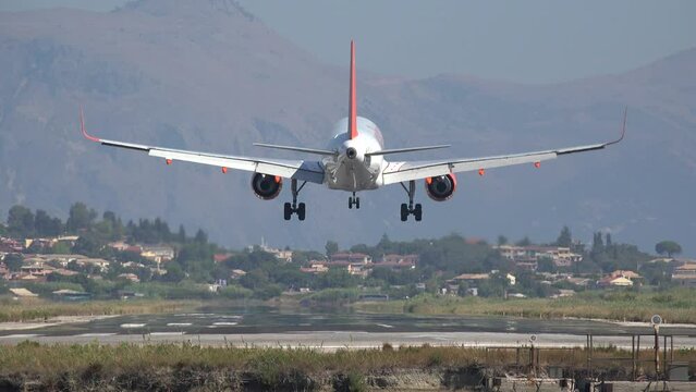 Plane Landing over Sea Water to Corfu Greece Arrival, Traveling by Airplane