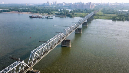 First Railway Bridge in Novosibirsk. Panorama of the city of Novosibirsk. View on the river Ob. Russia, From Dron