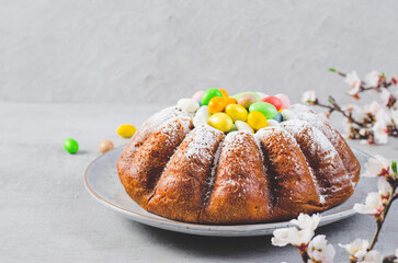 Easter Cake, Traditional Cake Decorated with Sugar Eggs on Bright Background