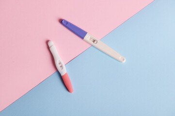 Top view inkjet pregnancy tests with taking place biochemical reaction between female urine and...