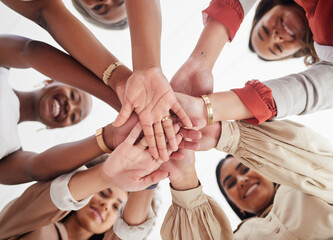 Team, business people and hands together, solidarity and support, low angle and collaboration in...