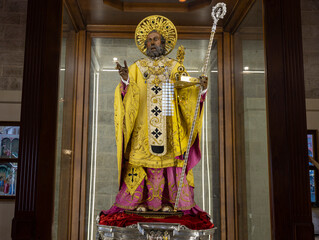 BARI, ITALY, JULY 9, 2023 - The Statue of Saint Nicholas inside the Basilica of Sain Nicholas of Bari, Italy