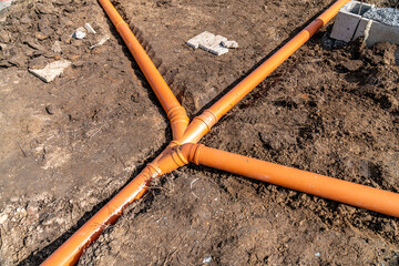 plastic pipe for sewage network in the base plate at the construction site