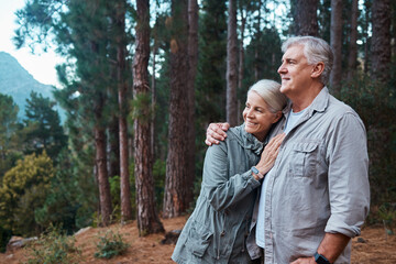 Hug, hiking and senior couple in forest, workout and quality time outdoor, happiness and wellness....