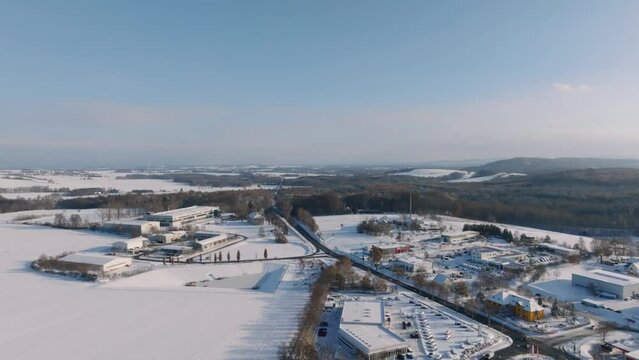Aerial flight over Bischofswerda at a sunny winter day. Drone move forward
