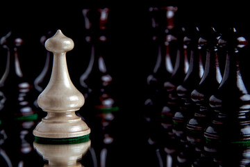 Chess figures on a black background