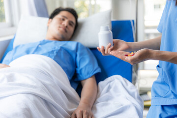 Nurse and male patient in hospital.