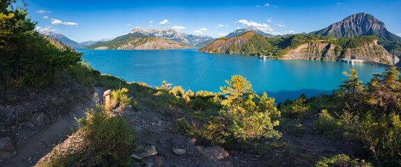 Fototapeta na wymiar Serre Poncon Lake in summer. Hautes Alpes (French Alps). France