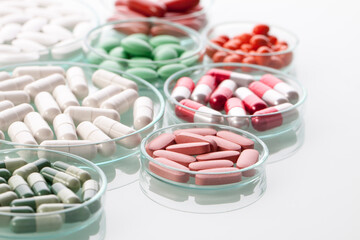 The composition capsules on a white background