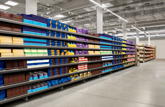 Cookies packagings different types and brands on shelf in supermarket. Suitable for presenting new packaging among many others.