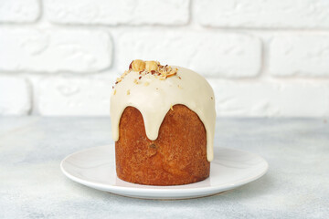 Traditional Easter cake with nuts on gray background