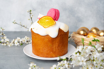 Beautiful Easter cake decorated with macarons cookie and dry orange piece