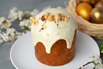 Traditional Easter cake with nuts on gray background
