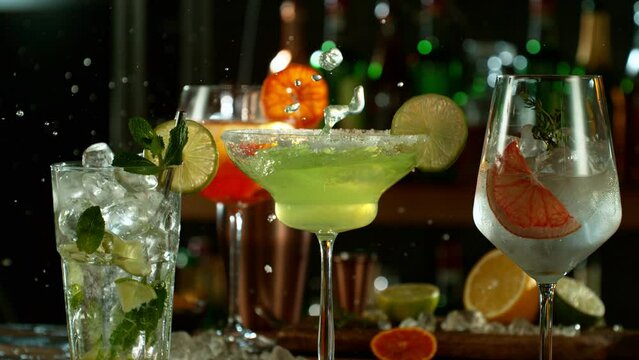 Super slow motion of making various cocktails with camera movement. Filmed on high speed cinema camera with cinebot, 1000 fps.