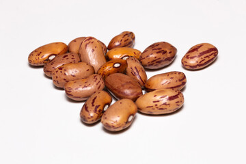 selective focus on pinto Beans isolated on white background