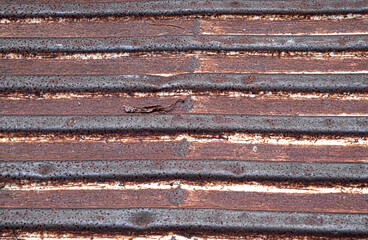 Rusted corrugated aluminum panel texture