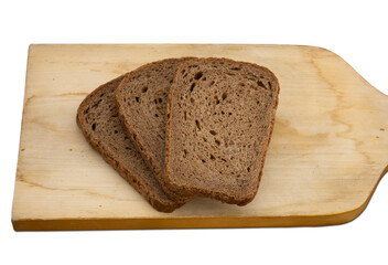 Three slices of black bread lie on a wooden board on a transparent PNG layer. Nutrition concept.