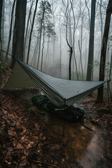 Wilderness Survival: Bushcraft Tent Under the Tarp in Heavy Rain, Embracing the Chill of Dawn - A Scene of Endurance and Resilience