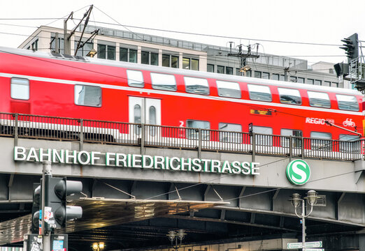 Red train at Friedrichstrasse station in city Berlin at Germany