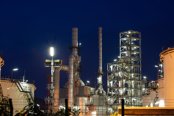 Twilight scene of tank oil refinery plant and tower column of Petrochemistry industry