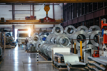 Rolls of galvanized steel sheet inside the metalworking factory