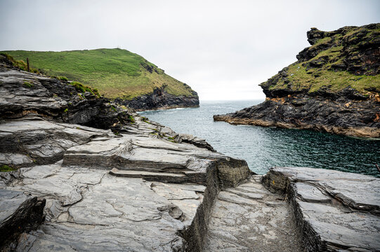 A view of lush cliffs along the coastline of Cornwall