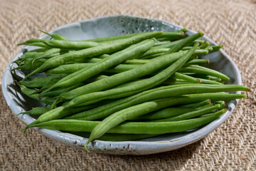 Raw fresh organic green beans ready to cook