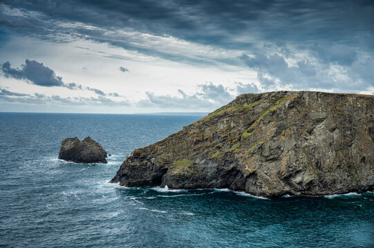 A rock structure jutting out into the sea