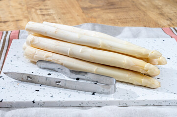 Spring season, new harvest of Dutch, German white asparagus, bunch of raw white asparagus