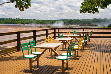 Obraz premium Restaurant terrace in front of the Garganta del Diablo Waterfall, Iguazu Waterfalls, Iguazu National Park, Brazil, South America