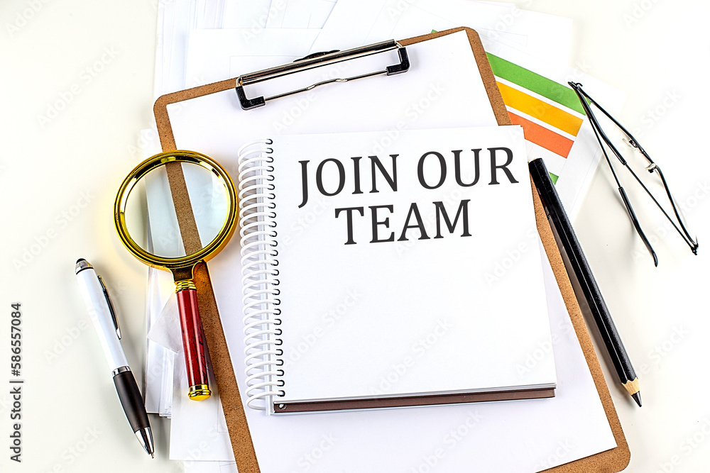 Poster join our team text on notebook with clipboard on white background