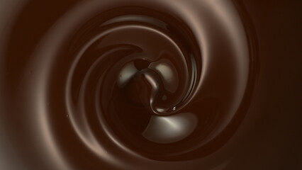 Fototapeta na wymiar Close-up of Whirling Melted Dark Chocolate