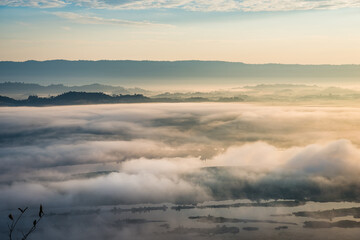 Obraz na płótnie Canvas Sunrise and the mist in winter morning