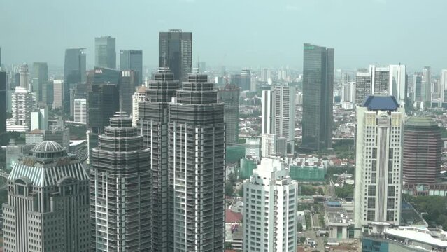 residential buildings, jakarta indonesia, district, city life, central, emerging economies, building exterior, sudirman, road, financial district, tall, highway, landmark, day, development, metropolit