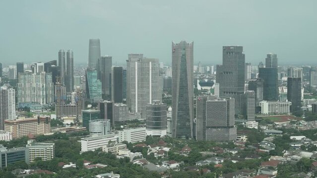 residential buildings, jakarta indonesia, district, city life, central, emerging economies, building exterior, sudirman, road, financial district, tall, highway, landmark, day, development, metropolit
