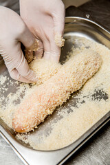 Step-by-step cooking cutlet with cheese and turkey with chicken breading from the chef