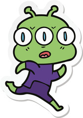 sticker of a cartoon three eyed alien