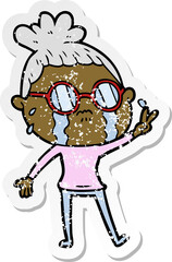 distressed sticker of a cartoon crying woman wearing spectacles