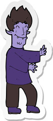 sticker of a cartoon excited vampire